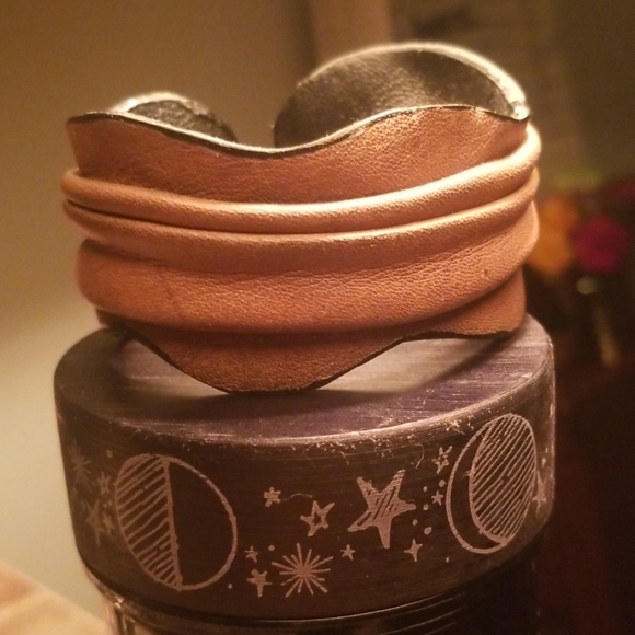 Jewelry - Folded leather wrist cuff.